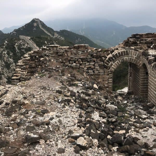 Partly destroyed watchtower of a wild section of The Great Wall with door
