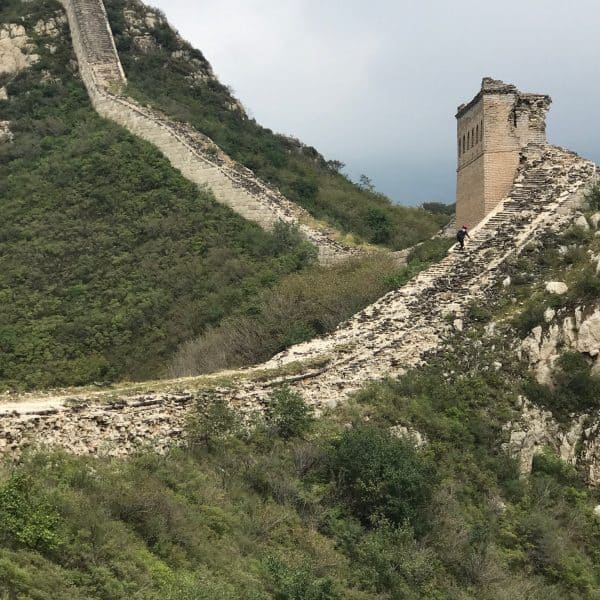 Partly destroyed wall and watchtower